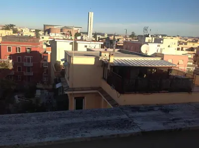 a view of a city from the roof of a building at Monolocale Monteverde in Rome