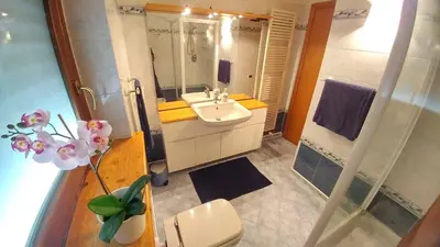a bathroom with a sink and a toilet and a shower at Terrace22 - Delizioso attico ben collegato in Rome