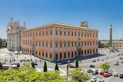 a large brick building with a street in front of it at Diana Romantic Loft in Rome