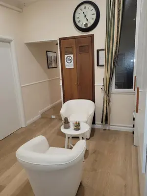 a bedroom with a mirror and a bed with towels on it at Evergreen in Rome