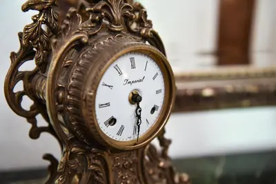 an ornate gold clock with the words grand prix on it at Hotel Regina Margherita in Rome