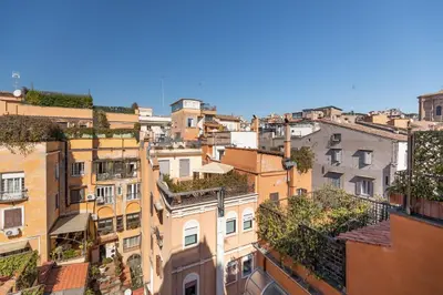 a view of the roofs of buildings at Trevi Comfortable Apartment with Terrace | Romeloft in Rome