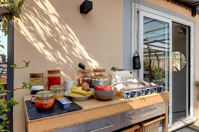a counter with fruit and other ingredients on it at Casa Modelli in Rome