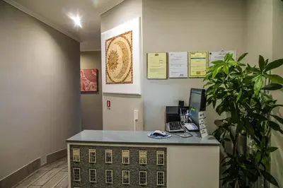 an office with a desk with a computer on it at Sole E Luna in Rome