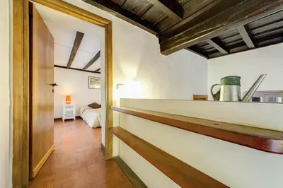 a hallway with a door leading to a room at Campo dei Fiori Stunning and Quiet in Rome