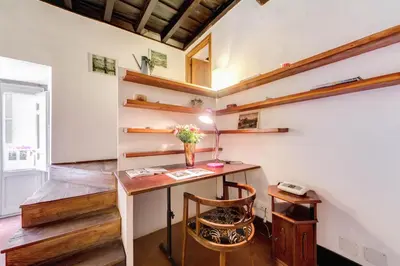 a home office with a desk and a chair at Campo dei Fiori Stunning and Quiet in Rome