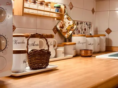 a counter top with cups and a basket on it at Paradiso Borgia in Rome