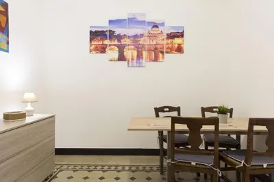 a dining room with a table and chairs at Central Apartment Navona Square in Rome