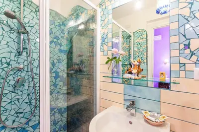 a bathroom with a shower and a sink at Gli Artisti Apartments Rome in Rome