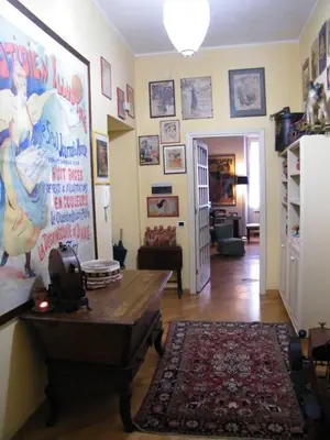 a living room with a couch and a table in it at Vacanze Romane in Rome