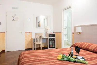 a bedroom with a bed with a tray of vegetables on it at Domus Giulia in Rome