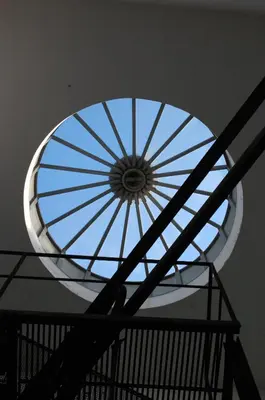 a window in the ceiling of a building at Sun Moon in Rome