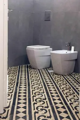 a bathroom with a toilet and a sink at Affittacamere ROMA FLAMINIO in Rome
