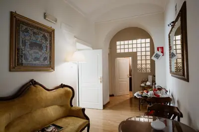 a living room with a couch and a table at La Girandola Bed & Breakfast in Rome