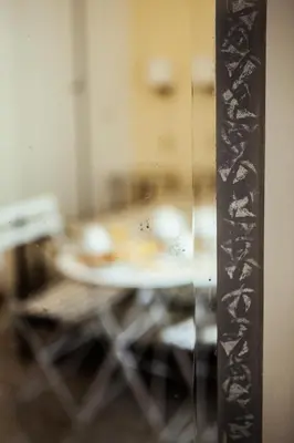 a table in a room with a counter top at La Fabbrica di San Pietro B&B in Rome