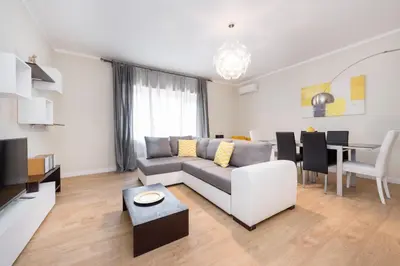 a living room with a couch and a table at Apartment Costanza in Rome in Rome