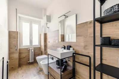 a bathroom with a sink and a toilet at Apartment Costanza in Rome in Rome