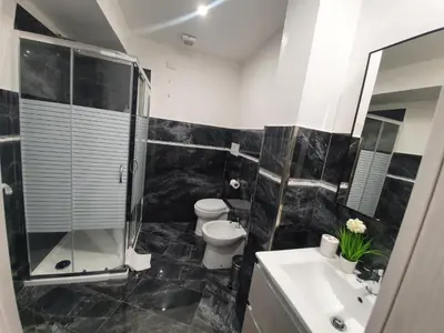 a bathroom with a toilet and a sink at My Rhome Prati in Rome