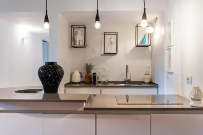 a kitchen with a sink and a vase on a counter at PgrHome Domus Pantheon in Rome