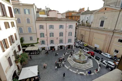 an overhead view of a city square with a fountain at Casa Santa Sofia in Rome