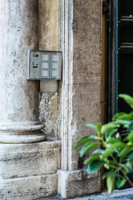 a metal box on the side of a building at Balestra Palace Apartment in Rome