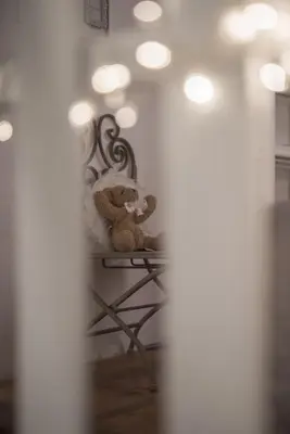 two teddy bears sitting on a chair in a room at Sweet Campo de Fiori in Rome
