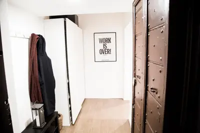 a hallway with a mirror and a door with a picture at Argentina Exclusive Apartment in Rome