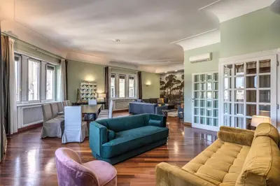 a living room with couches and chairs at DOWNTOWN SRL - Imperial Panorama Penthouse in Rome