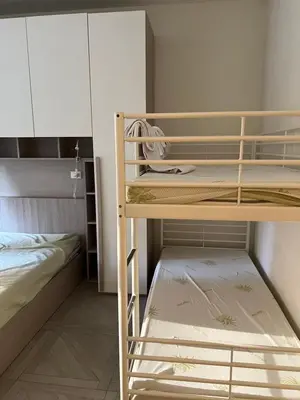 a room with two bunk beds and a bed at San Pietro house in Rome