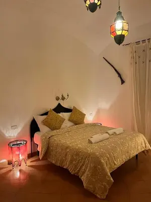 a bedroom with a large bed in a room at CK Rooms in Rome