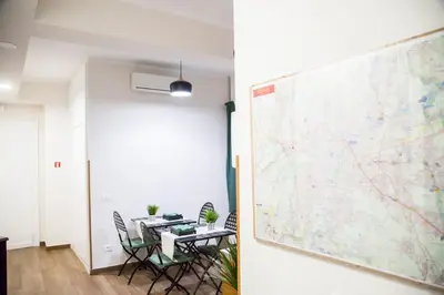 a meeting room with a large map on the wall at Vatican Suite 383 in Rome