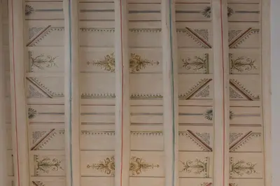 a wooden door with flowers on it at Hotel Navona in Rome