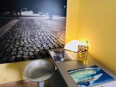 a hotel room with a large bed and a desk at Piazza di Spagna Prestige in Rome