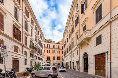 a small car parked on a street next to buildings at Pantheon Luxury House in Rome