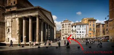 a group of people walking in a city with a red arrow at Domus Rotundae Pantheon in Rome