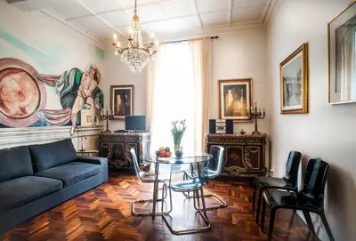 a living room with a couch and a table at Santa Cecilia Apartment in Via del Corso in Rome