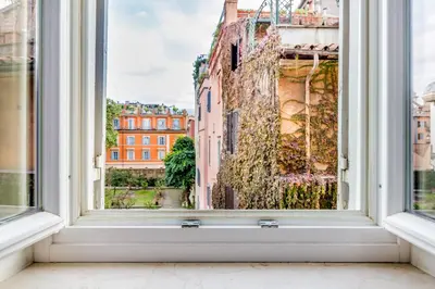 an open window with a view of a building at Giulia's holidays in Rome