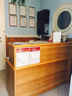 a wooden counter top with signs on it at Residence Lodi in Rome