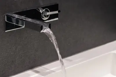 a stream of water coming out of a bathroom faucet at Domus Quiritum Elite, Vatican luxury apartment in Rome