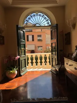 an open door with a view of a building at B&B VILLINO MARGHERITA in Rome