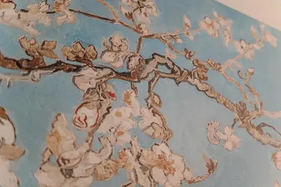 a painting of flowers on a blue wall at L'Agata (Trastevere) in Rome
