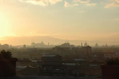a view of a city at sunset at Penthouseinrome in Rome