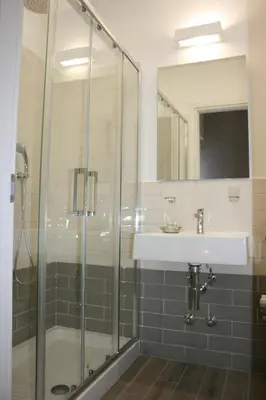 a bathroom with a sink and a shower at Il B&B della Mamma in Rome
