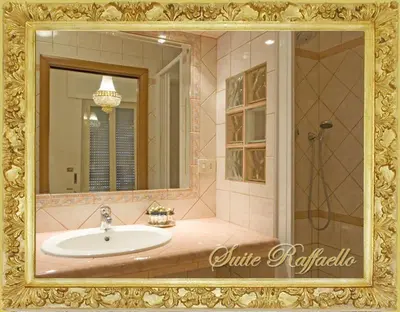 a bathroom with a sink and a mirror at B&B Babri Simim Taj in Rome