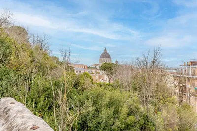 a view of a city with a building in the background at Il Nido di Lulu in Rome