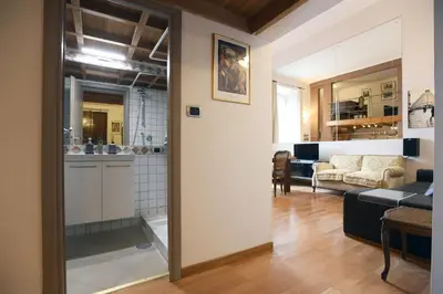 a kitchen and living room with a view of a living room at Lo Chalet in Rome