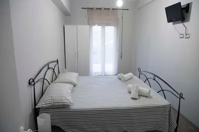 a bedroom with two beds with towels on them at Green view apartment in Rome