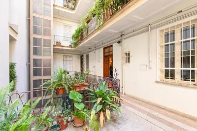 a balcony of a building with plants at Urbana Apartment Colosseum in Rome