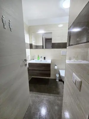 a bathroom with a sink and a mirror at Myomax Guesthouse Hospety Group in Rome