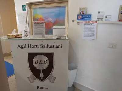 a sign that says a sixth hottest salventhacistacistacistacist at Bed & Breakfast Agli Horti Sallustiani in Rome